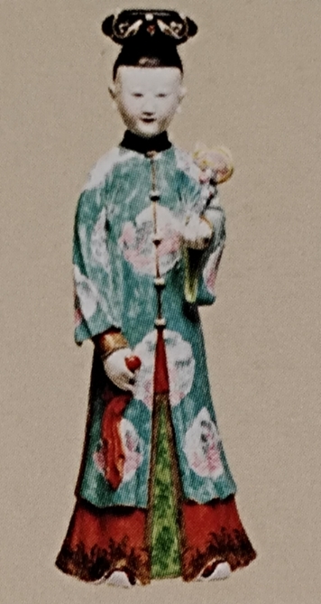 戴钿子瓷女像